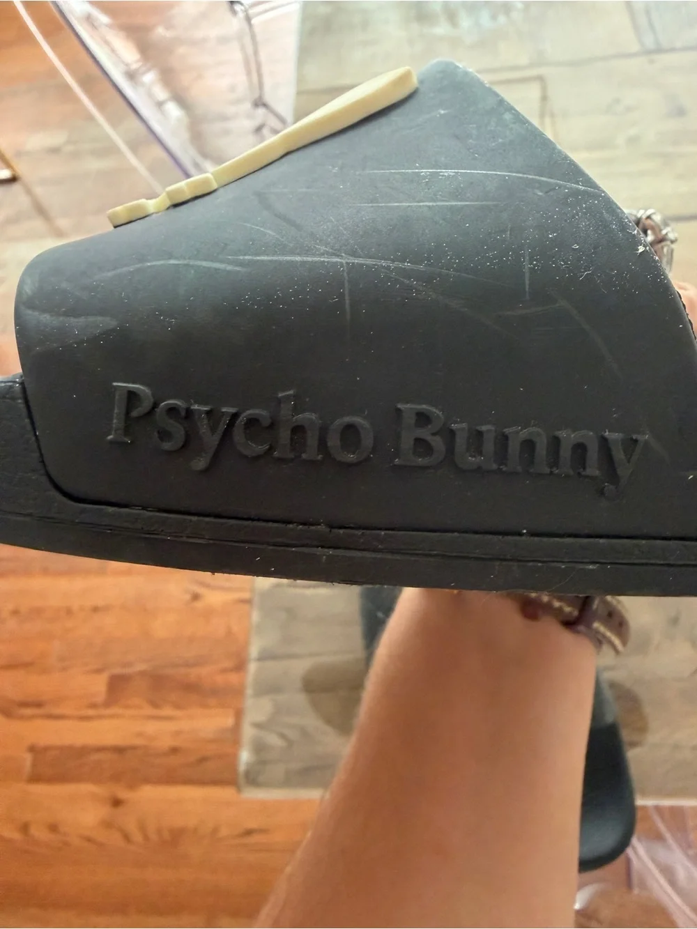 Psycho Bunny Black Slides with Cream Skull-and-Crossbones Logo